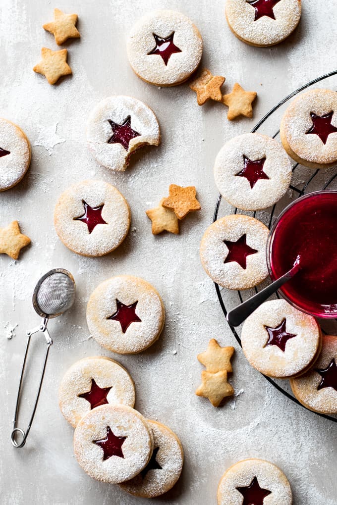 Traditionally made for Christmas and other holidays, these Linzer cookies are soft but crumbly, sandwiched together with homemade raspberry jam.⎪www.anasbakingchronicles.com