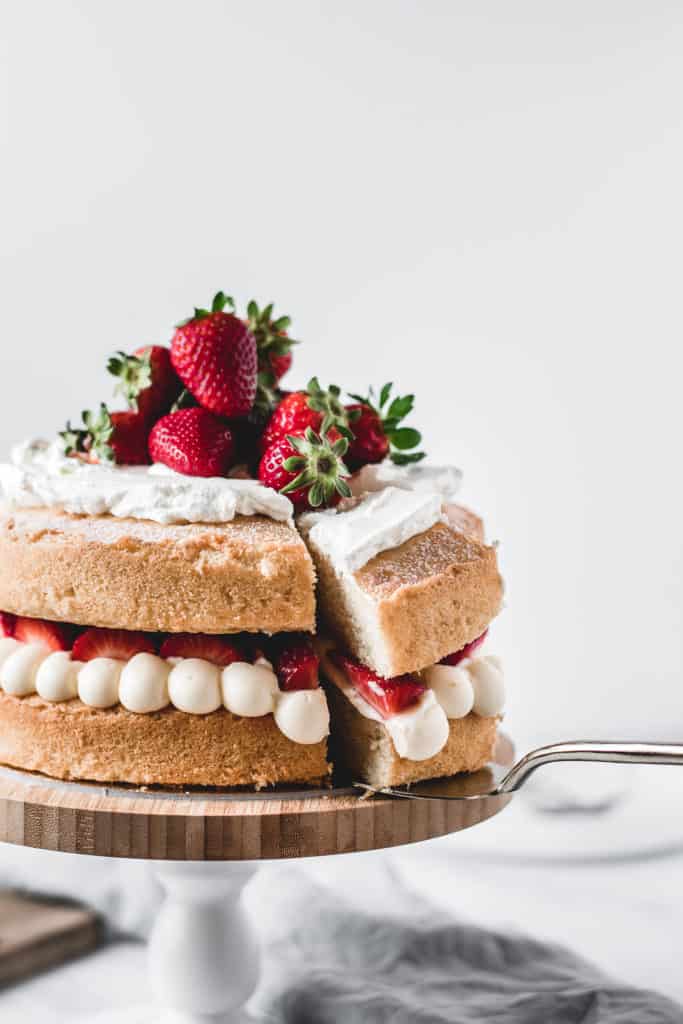 This is one of those traditional bakes that everyone's going to love. Soft and fluffy vanilla cake layers filled with light and airy diplomat cream and fresh strawberries. Delicious!⎪www.anasbakingchronicles.com