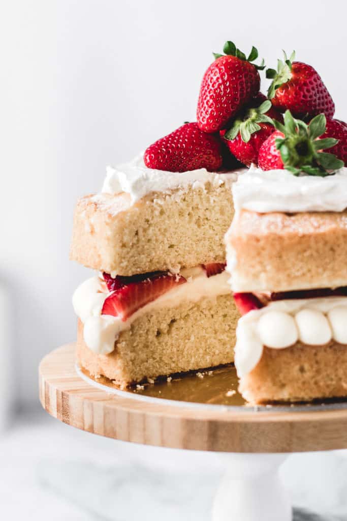 This is one of those traditional bakes that everyone's going to love. Soft and fluffy vanilla cake layers filled with light and airy diplomat cream and fresh strawberries. Delicious!⎪www.anasbakingchronicles.com