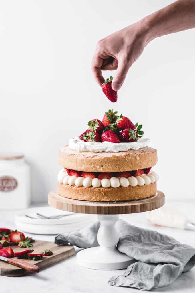 This is one of those traditional bakes that everyone's going to love. Soft and fluffy vanilla cake layers filled with light and airy diplomat cream and fresh strawberries. Delicious!⎪www.anasbakingchronicles.com