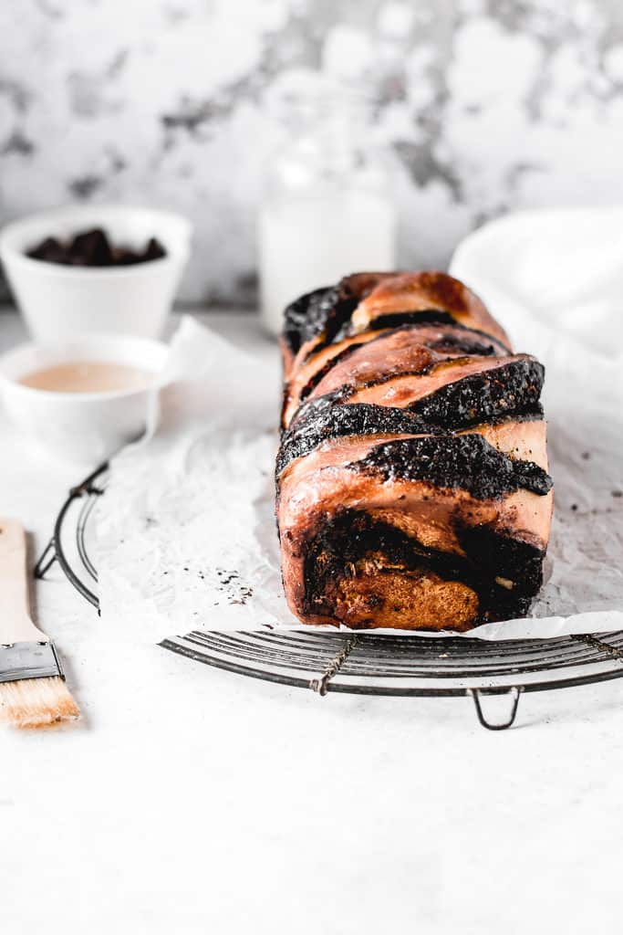 This amazing Chocolate Babka is made from soft and rich brioche dough, which is filled with luscious chocolate filling. Perfect recipe for fall baking! ⎪www.anasbakingchronicles.com
