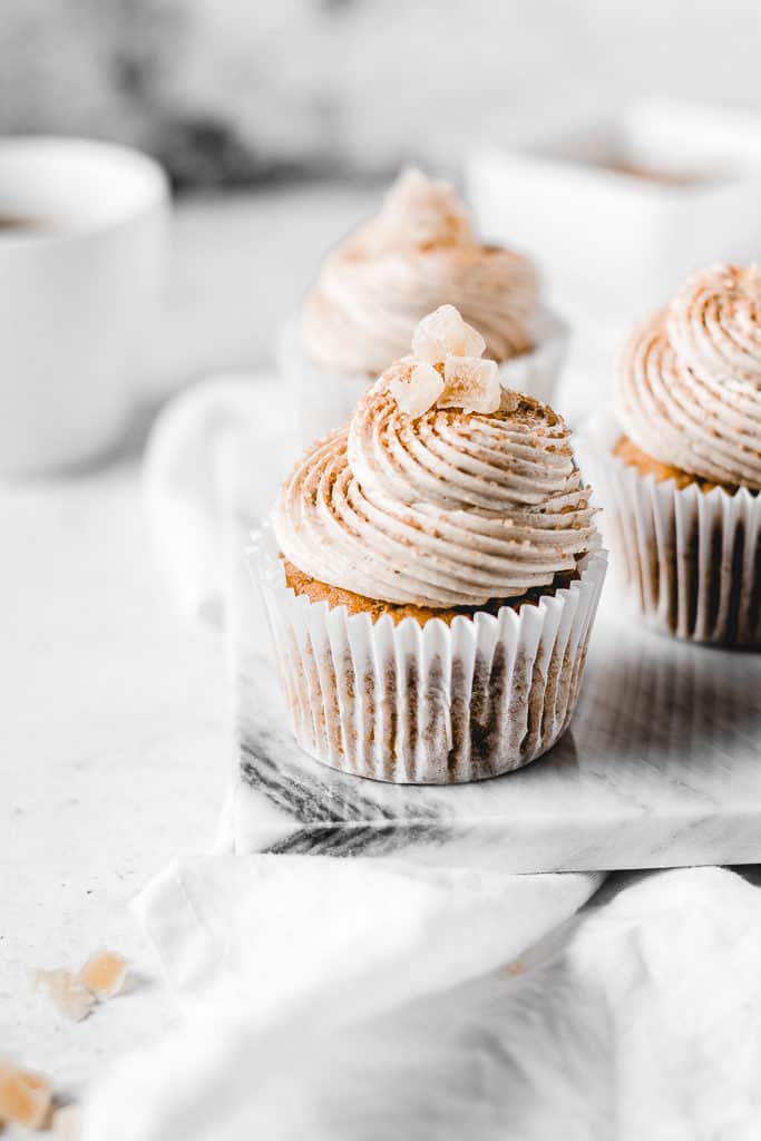 I’m welcoming October with these Pumpkin Spice Latte cupcakes. Fluffy and moist pumpkin spice cupcakes, topped with silky latte buttercream, cinnamon sugar and candied ginger.