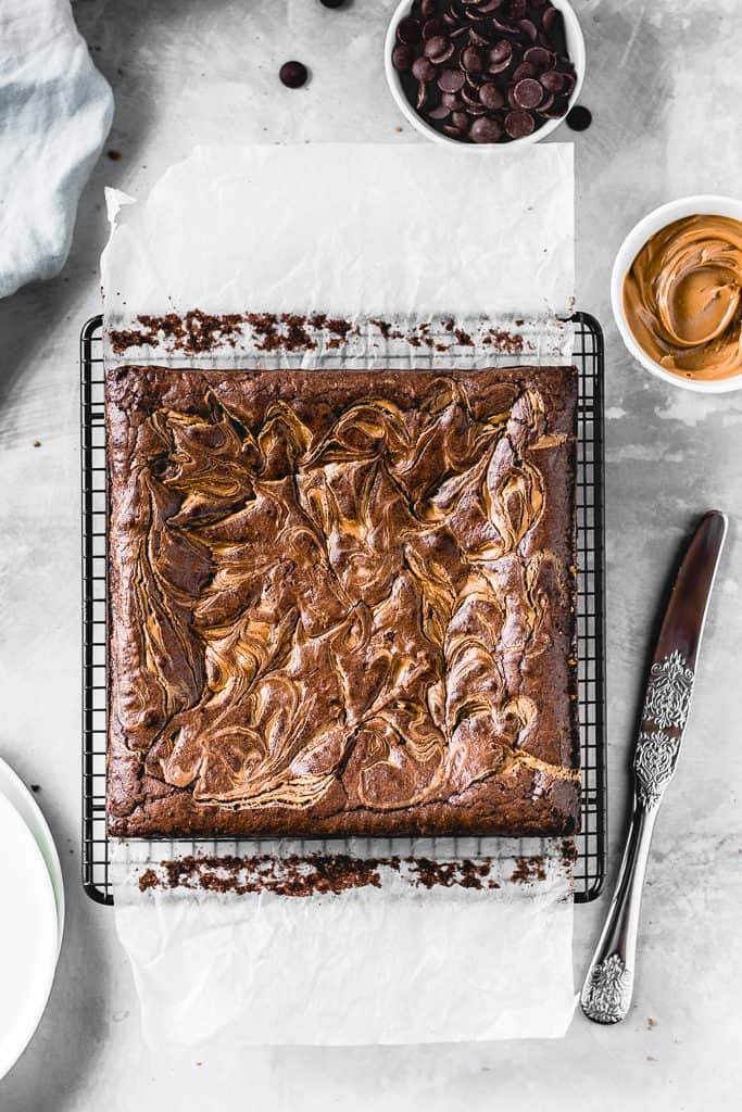 These Cookie Butter Swirl Brownies are one of the best things I've ever made. With a biscoff cookie crust on the bottom, luscious fudgy brownie in the middle and biscoff cookie butter swirl on top - this is THE chocolate dessert you need in your life!