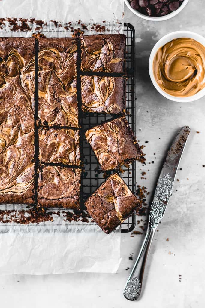 These Cookie Butter Swirl Brownies are one of the best things I've ever made. With a biscoff cookie crust on the bottom, luscious fudgy brownie in the middle and biscoff cookie butter swirl on top - this is THE chocolate dessert you need in your life!