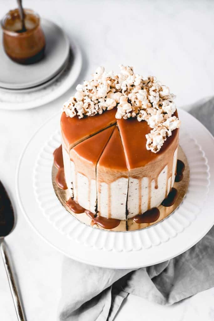 Three layers of rich, moist chocolate cake, paired with amazing brown butter popcorn frosting and caramel popcorn in between the layers for a little bit of crunch! Heavily drizzled with caramel sauce, this Caramel Popcorn Chocolate Cake is a showstopper! ⎪www.anasbakingchronicles.com

#chocolatecake
#caramelpopcorn
#caramelpopcorncake
#brownbutterfrosting 