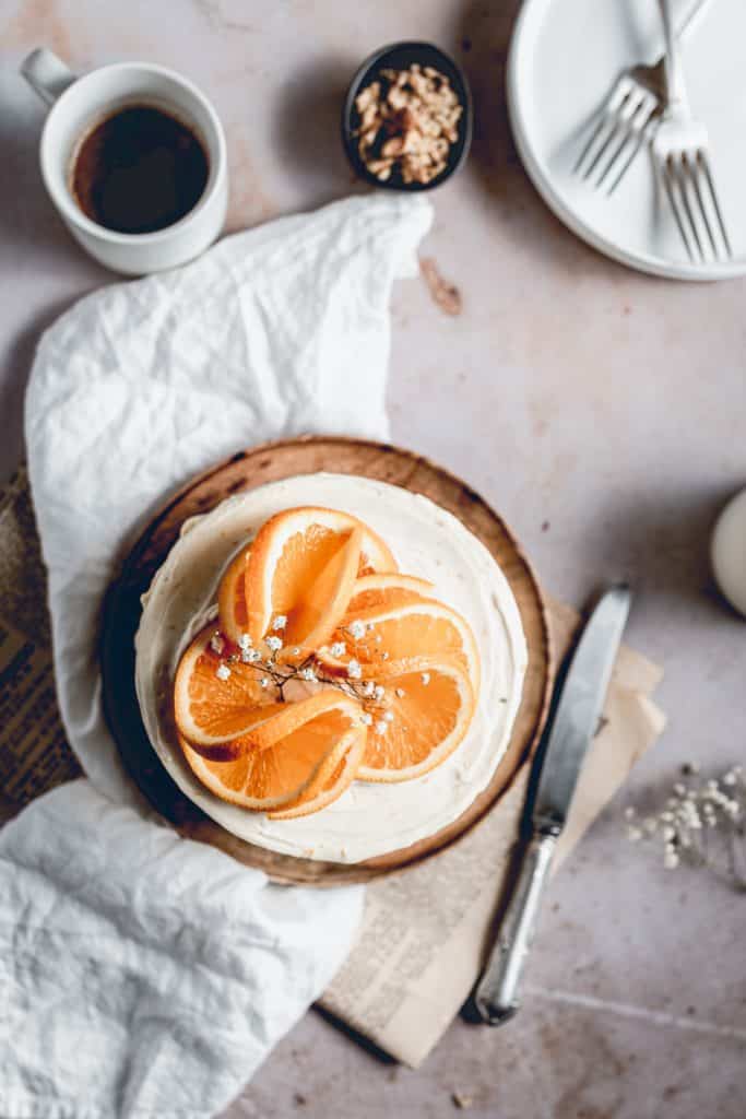 This delicious Carrot Cake is the perfect choice for special occasions or just because it's Sunday! Packed full of carrots, cinnamon and walnuts, it's paired with tangy Orange Cream Cheese frosting and will quickly become your favourite!