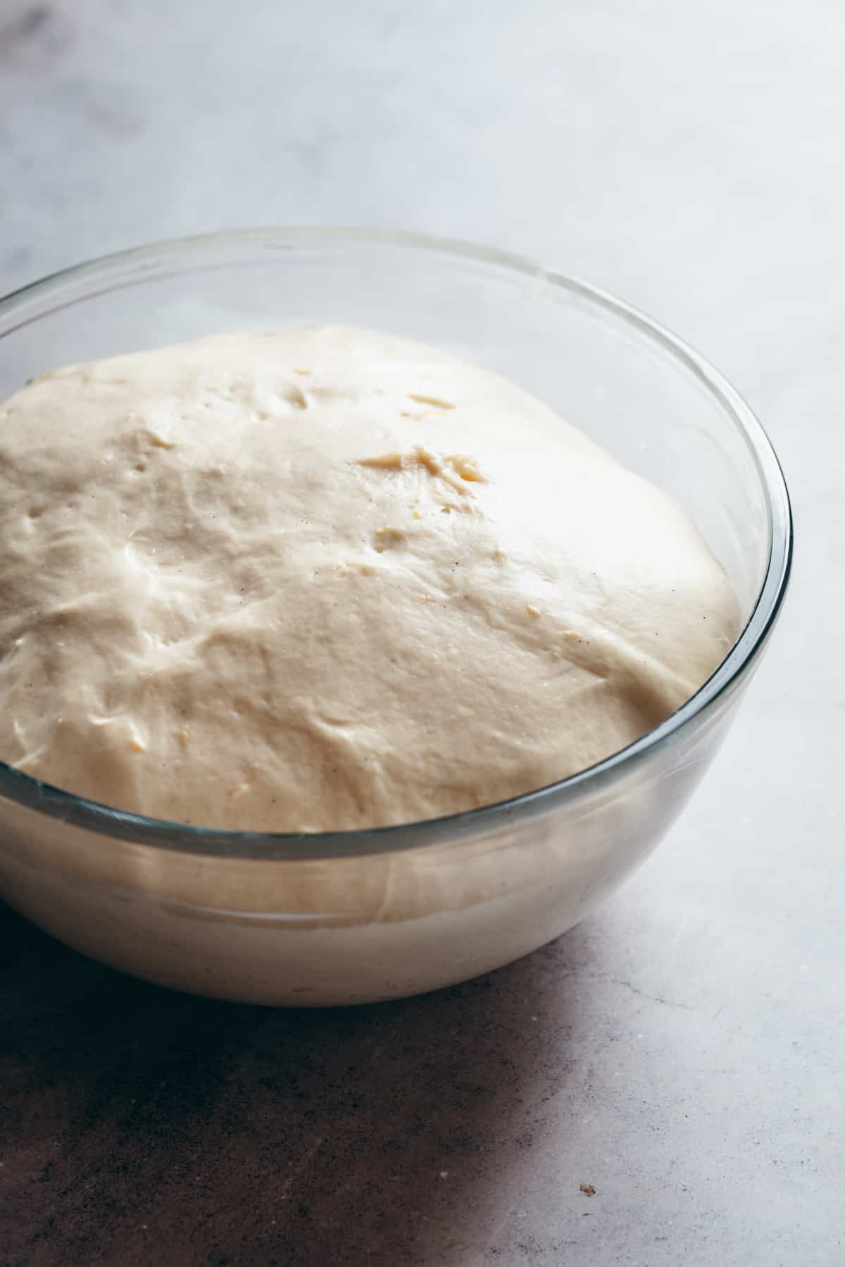 Dough in a bowl, doubled in size after proofing