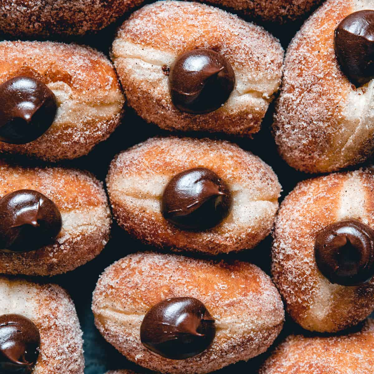 https://www.anasbakingchronicles.com/wp-content/uploads/2022/03/Chocolate-Brioche-Doughnuts-featured-image-2.jpg