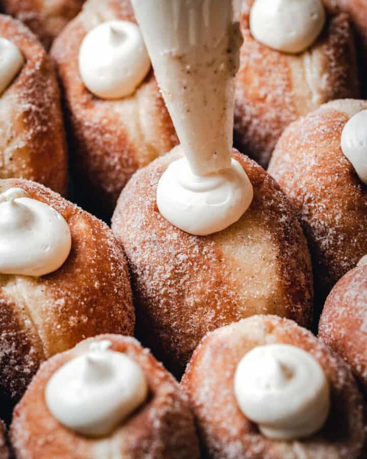 Iconic donut filled with Bavarian cream and glazed.